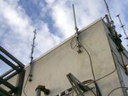 Picture of communications equipment on building.