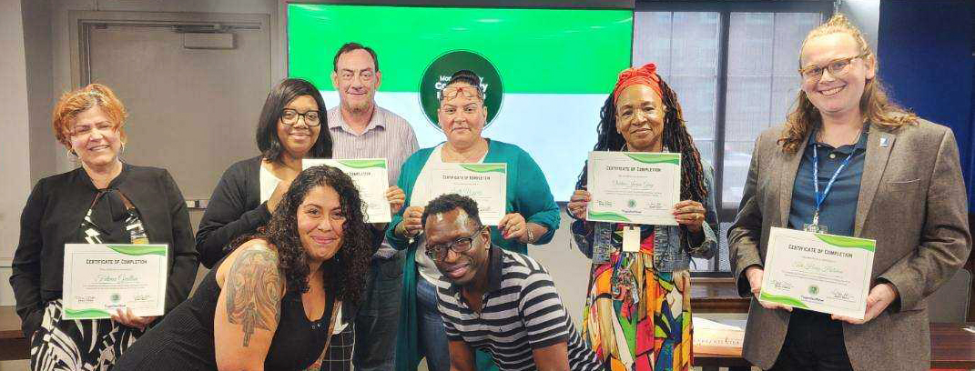 Group of CBO Benefits trainees receiving their certificates