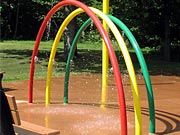 Picture of playground with standing water.